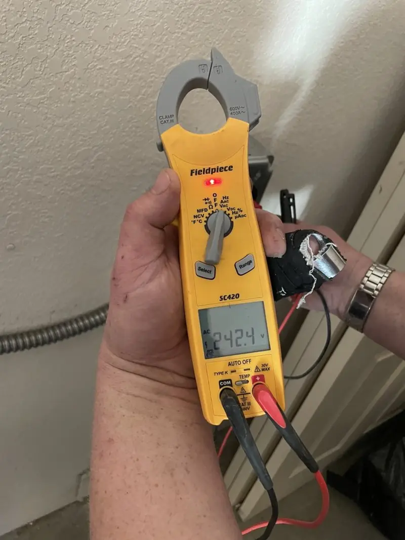 Voltage testing with clamp meter during Recessed Lighting Installation in Sulphur